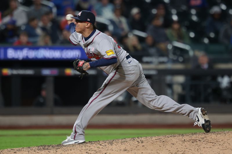 May 12, 2024; New York City, New York, USA; Atlanta Braves relief pitcher Jesse Chavez (60) delivers a pitch during the eighth inning against the New York Mets at Citi Field. Mandatory Credit: Vincent Carchietta-USA TODAY Sports