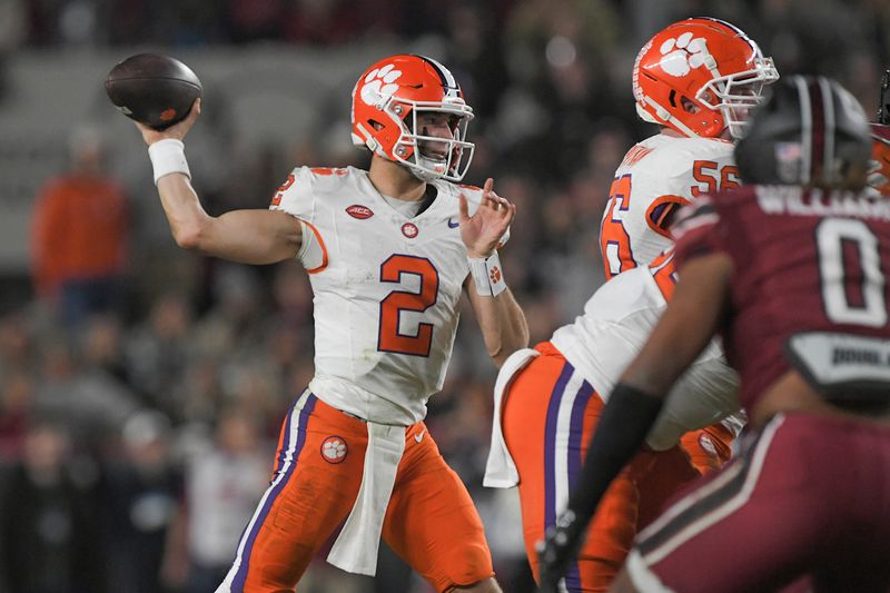 Nov 25, 2023; Columbia, South Carolina, USA; Clemson Tigers quarterback Cade Klubnik (2) throws a pass against the South Carolina Gamecocks during the second quarter at Williams-Brice Stadium. Mandatory Credit: Ken Ruinard-USA TODAY Sports