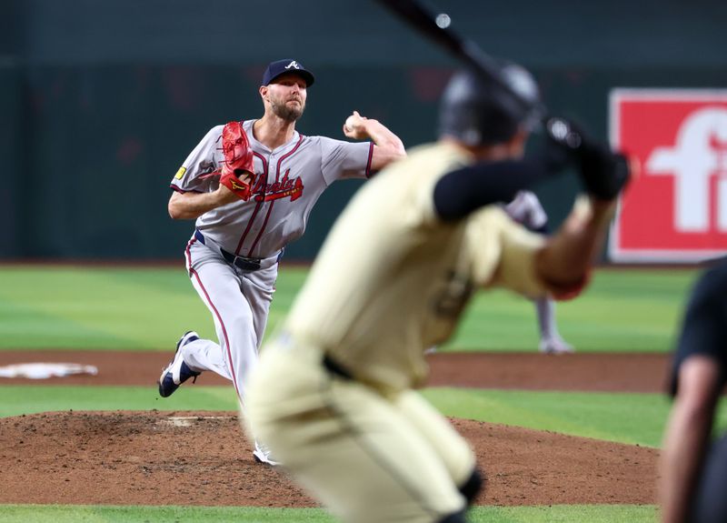 Jul 9, 2024; Phoenix, Arizona, USA; Atlanta Braves pitcher Chris Sale throws in the third inning against the Arizona Diamondbacks at Chase Field. Mandatory Credit: Mark J. Rebilas-USA TODAY Sports