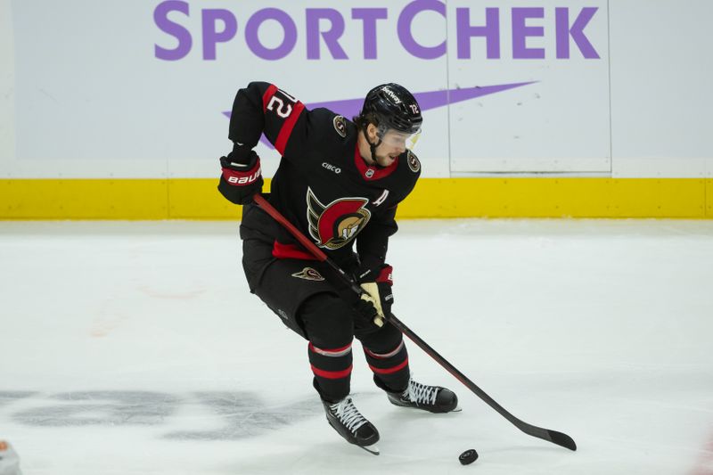 Nov 19, 2024; Ottawa, Ontario, CAN; Ottawa Senators defenseman Thomas Chabot (72) skates with the puck in the third period against the Edmonton Oilers at the Canadian Tire Centre. Mandatory Credit: Marc DesRosiers-Imagn Images