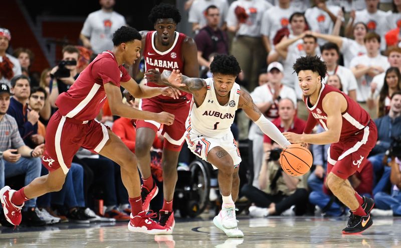 Feb 11, 2023; Auburn, Alabama, USA; Auburn Tigers guard Wendell Green Jr. (1) takes the ball from Alabama Crimson Tide possession at Neville Arena. Mandatory Credit: Julie Bennett-USA TODAY Sports

