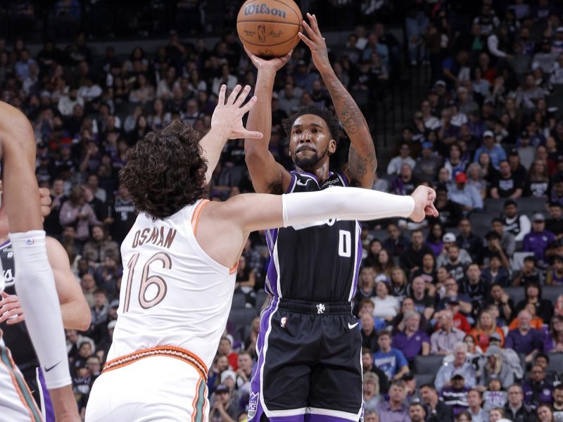 SACRAMENTO, CA - FEBRUARY 22: Malik Monk #0 of the Sacramento Kings shoots the ball during the game against the San Antonio Spurs on February 22, 2024 at Golden 1 Center in Sacramento, California. NOTE TO USER: User expressly acknowledges and agrees that, by downloading and or using this Photograph, user is consenting to the terms and conditions of the Getty Images License Agreement. Mandatory Copyright Notice: Copyright 2023 NBAE (Photo by Rocky Widner/NBAE via Getty Images)