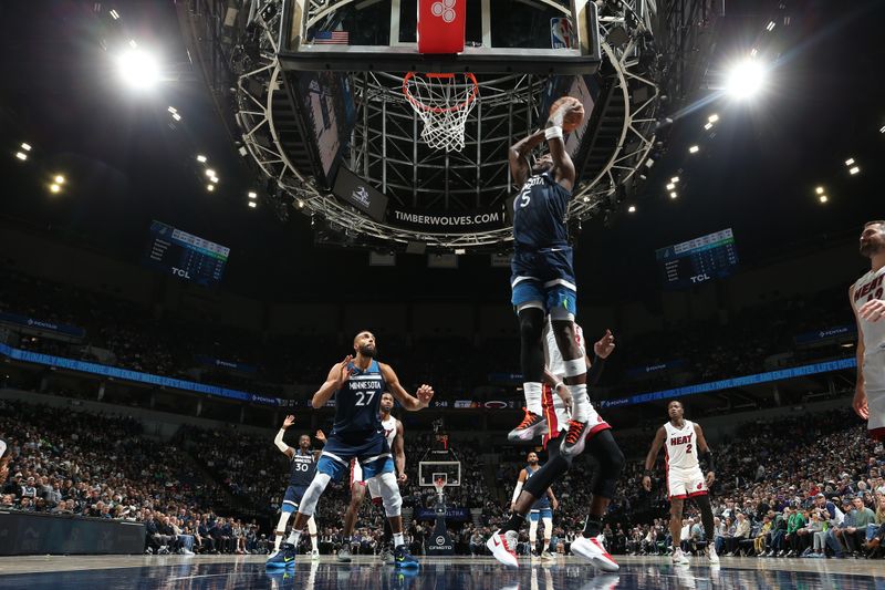 MINNEAPOLIS, MN -  NOVEMBER 10: Anthony Edwards #5 of the Minnesota Timberwolves dunks the ball during the game against the Miami Heat on November 10, 2024 at Target Center in Minneapolis, Minnesota. NOTE TO USER: User expressly acknowledges and agrees that, by downloading and or using this Photograph, user is consenting to the terms and conditions of the Getty Images License Agreement. Mandatory Copyright Notice: Copyright 2024 NBAE (Photo by David Sherman/NBAE via Getty Images)