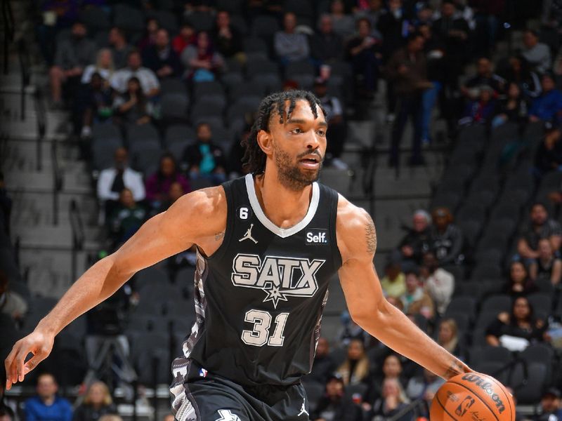 SAN ANTONIO, TX - FEBUARY 3:  Keita Bates-Diop #31 of the San Antonio Spurs handles the ball during the game on Febuary 3, 2023 at the AT&T Center in San Antonio, Texas. NOTE TO USER: User expressly acknowledges and agrees that, by downloading and or using this photograph, user is consenting to the terms and conditions of the Getty Images License Agreement. Mandatory Copyright Notice: Copyright 2023 NBAE (Photos by Michael Gonzales/NBAE via Getty Images)