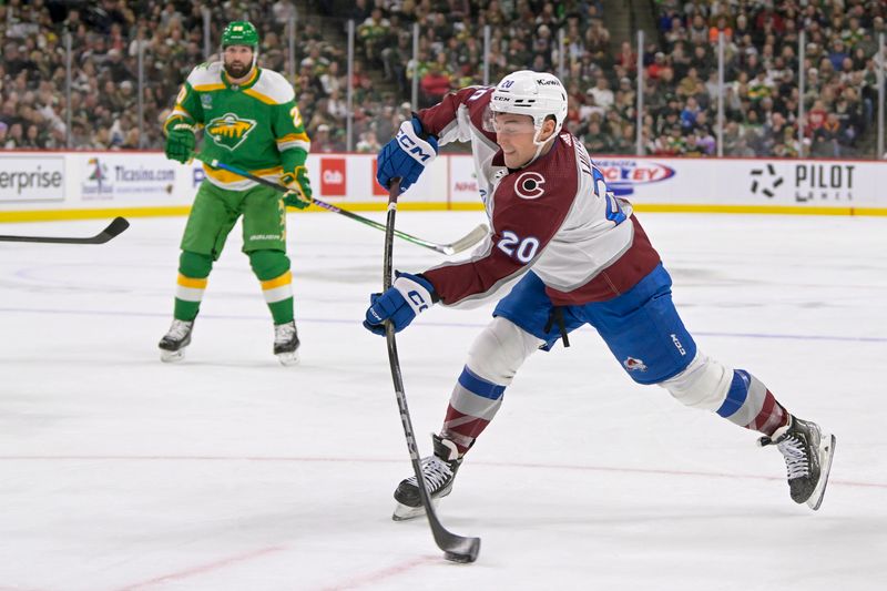 Nov 24, 2023; Saint Paul, Minnesota, USA; Colorado Avalanche forward Ross Colton (20) scores a goal against the Minnesota Wild during the first period at Xcel Energy Center. Mandatory Credit: Nick Wosika-USA TODAY Sports