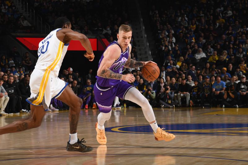 SAN FRANCISCO, CA - APRIL 14: Luka Samanic #19 of the Utah Jazz dribbles the ball during the game against the Golden State Warriors on April 14, 2024 at Chase Center in San Francisco, California. NOTE TO USER: User expressly acknowledges and agrees that, by downloading and or using this photograph, user is consenting to the terms and conditions of Getty Images License Agreement. Mandatory Copyright Notice: Copyright 2024 NBAE (Photo by Noah Graham/NBAE via Getty Images)