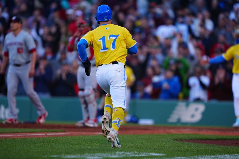 May 11, 2024; Boston, Massachusetts, USA; Boston Red Sox left fielder Tyler O'Neill (17) scores a run on Boston Red Sox third baseman Rafael Devers (not pictured) RBI double against the Washington Nationals during the eighth inning at Fenway Park. Mandatory Credit: Gregory Fisher-USA TODAY Sports