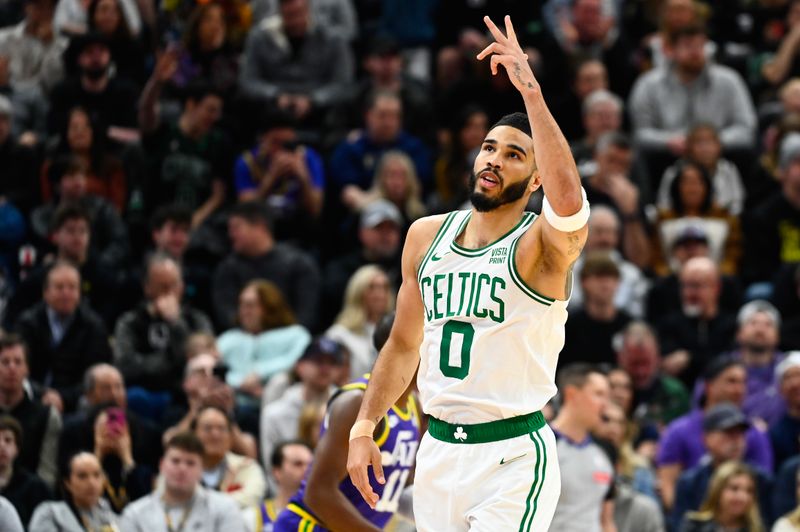 SALT LAKE CITY, UTAH - MARCH 12: Jayson Tatum #0 of the Boston Celtics celebrates a three point shot during the first half of a game against the Utah Jazz at Delta Center on March 12, 2024 in Salt Lake City, Utah. NOTE TO USER: User expressly acknowledges and agrees that, by downloading and or using this photograph, User is consenting to the terms and conditions of the Getty Images License Agreement. (Photo by Alex Goodlett/Getty Images)