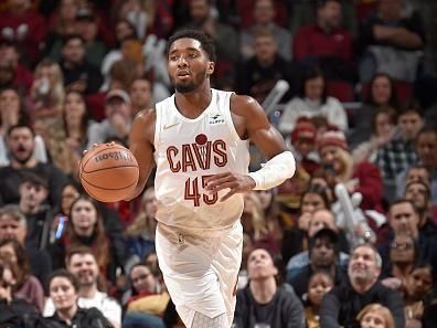 CLEVELAND, OH - DECEMBER 18: Donovan Mitchell #45 of the Cleveland Cavaliers brings the ball up court against the Houston Rockets on December 18, 2023 at Rocket Mortgage FieldHouse in Cleveland, Ohio. NOTE TO USER: User expressly acknowledges and agrees that, by downloading and/or using this Photograph, user is consenting to the terms and conditions of the Getty Images License Agreement. Mandatory Copyright Notice: Copyright 2023 NBAE (Photo by David Liam Kyle/NBAE via Getty Images)