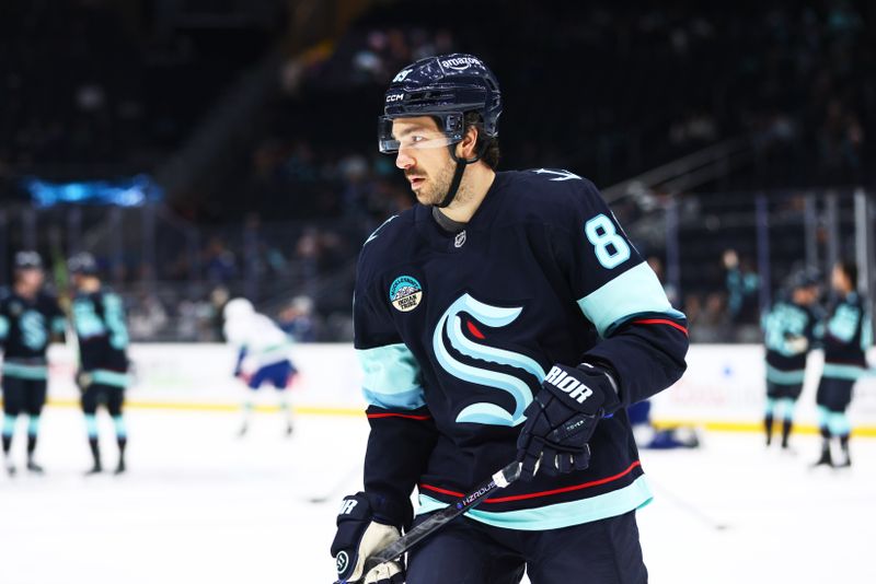 Feb 28, 2026; Seattle, Washington, USA;Seattle Kraken center Frederick Gaudreau (89) looks on before the game against the Vancouver Canucks at Climate Pledge Arena. Mandatory Credit: Blake Dahlin-Imagn Images
