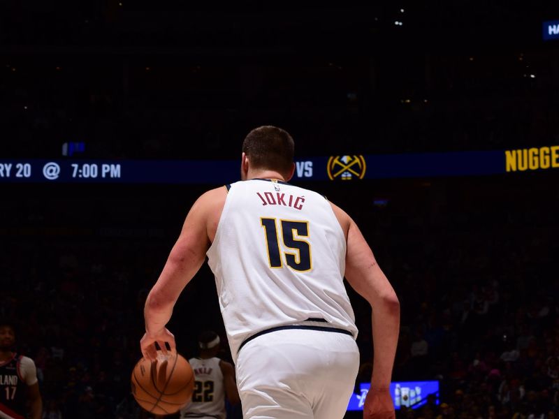 DENVER, CO - FEBRUARY 10: Nikola Jokic #15 of the Denver Nuggets dribbles the ball during the game against the Portland Trail Blazers on February 10, 2025 at Ball Arena in Denver, Colorado. NOTE TO USER: User expressly acknowledges and agrees that, by downloading and/or using this Photograph, user is consenting to the terms and conditions of the Getty Images License Agreement. Mandatory Copyright Notice: Copyright 2025 NBAE (Photo by Garrett Ellwood/NBAE via Getty Images)