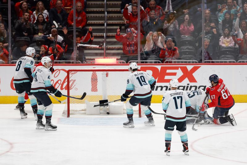 Jan 11, 2024; Washington, District of Columbia, USA; Washington Capitals left wing Max Pacioretty (67) scores a goal on Seattle Kraken goaltender Joey Daccord (35) in the second period at Capital One Arena. Mandatory Credit: Geoff Burke-USA TODAY Sports