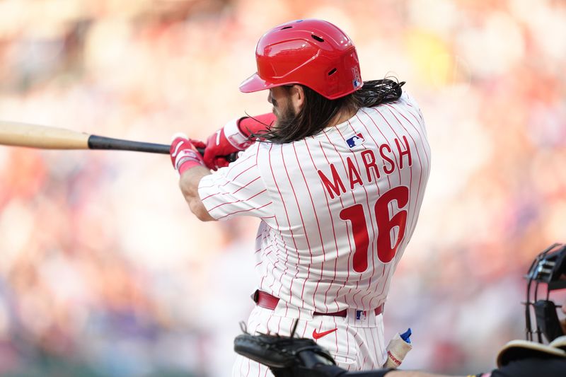 May 17, 2025; Philadelphia, Pennsylvania, USA; Philadelphia Phillies outfielder Brandon Marsh (16) hits a double against the Pittsburgh Pirates in the fourth inning at Citizens Bank Park. Mandatory Credit: Kyle Ross-Imagn Images