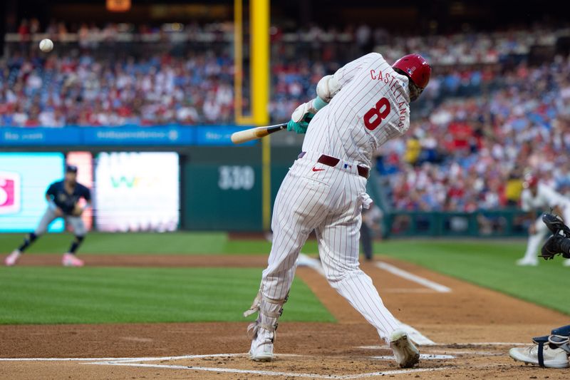 Sep 11, 2024; Philadelphia, Pennsylvania, USA; Philadelphia Phillies outfielder Nick Castellanos (8) hits a two RBI home run during the first inning against the Tampa Bay Rays at Citizens Bank Park. Mandatory Credit: Bill Streicher-Imagn Images