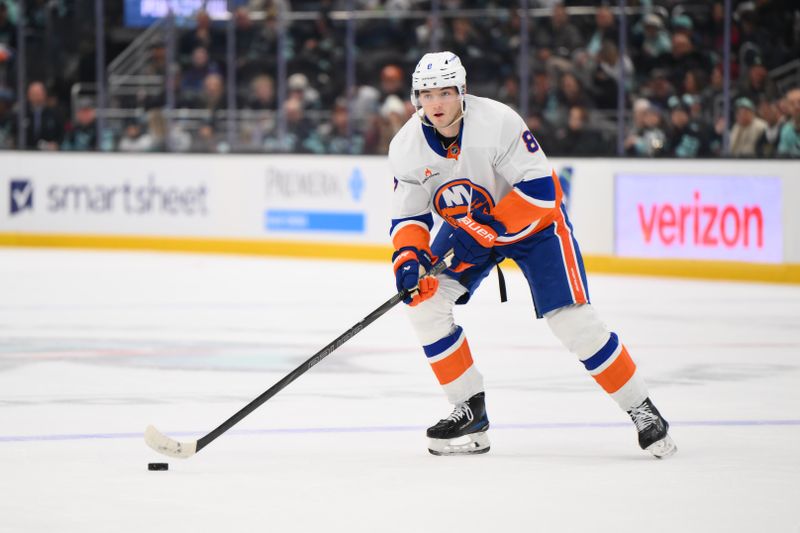 Nov 16, 2024; Seattle, Washington, USA; New York Islanders defenseman Noah Dobson (8) plays the puck during the second period against the Seattle Kraken at Climate Pledge Arena. Mandatory Credit: Steven Bisig-Imagn Images