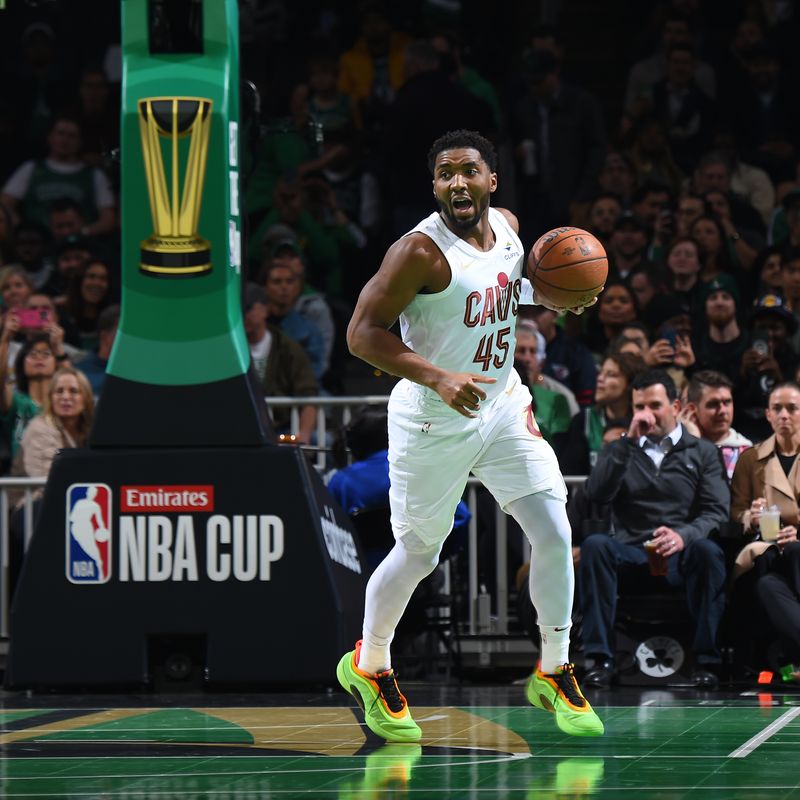 BOSTON, MA - NOVEMBER 19:  Donovan Mitchell #45 of the Cleveland Cavaliers dribbles the ball during the game against the Boston Celtics  during the Emirates NBA Cup game on November 19, 2024 at TD Garden in Boston, Massachusetts. NOTE TO USER: User expressly acknowledges and agrees that, by downloading and/or using this Photograph, user is consenting to the terms and conditions of the Getty Images License Agreement. Mandatory Copyright Notice: Copyright 2024 NBAE (Photo by Brian Babineau/NBAE via Getty Images)