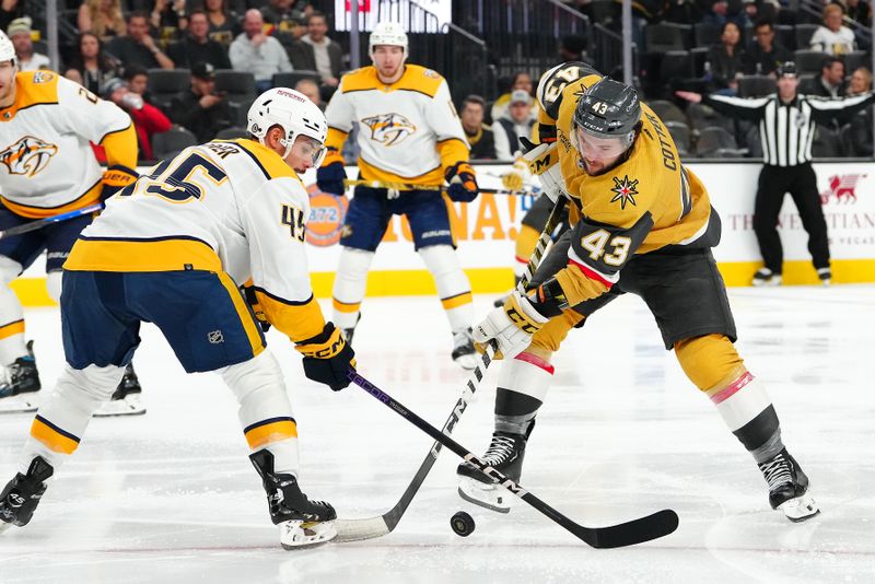 Feb 20, 2024; Las Vegas, Nevada, USA; Nashville Predators defenseman Alexandre Carrier (45) blocks a dump in attempt by Vegas Golden Knights center Paul Cotter (43) during the second period at T-Mobile Arena. Mandatory Credit: Stephen R. Sylvanie-USA TODAY Sports