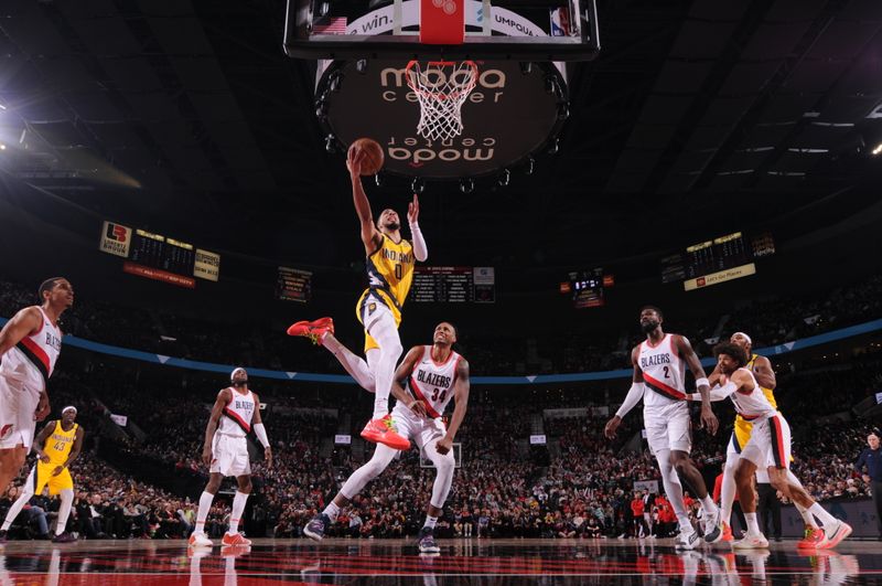 PORTLAND, OR - JANUARY 19:  Tyrese Haliburton #0 of the Indiana Pacers drives to the basket during the game against the Portland Trail Blazers on January 19, 2024 at the Moda Center Arena in Portland, Oregon. NOTE TO USER: User expressly acknowledges and agrees that, by downloading and or using this photograph, user is consenting to the terms and conditions of the Getty Images License Agreement. Mandatory Copyright Notice: Copyright 2024 NBAE (Photo by Cameron Browne/NBAE via Getty Images)