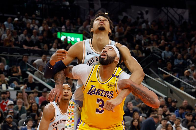 SAN ANTONIO, TEXAS - NOVEMBER 27: Anthony Davis #3 of the Los Angeles Lakers and Victor Wembanyama #1 of the San Antonio Spurs battle for position during the third quarter at Frost Bank Center on November 27, 2024 in San Antonio, Texas. NOTE TO USER: User expressly acknowledges and agrees that, by downloading and or using this photograph, User is consenting to the terms and conditions of the Getty Images License Agreement (Photo by Ronald Cortes/Getty Images)