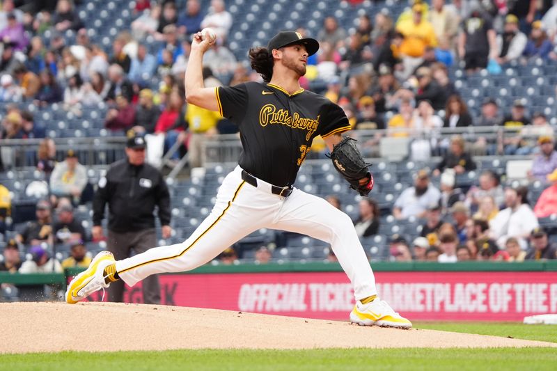 May 4, 2024; Pittsburgh, Pennsylvania, USA;  Pittsburgh Pirates pitcher Jared Jones (37) delivers a pitch against the Colorado Rockies during the first inning at PNC Park. Mandatory Credit: Gregory Fisher-USA TODAY Sports