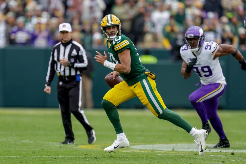 Green Bay Packers quarterback Jordan Love (10) rushes during an NFL football game between the Green Bay Packers and Minnesota Vikings Sunday, Oct. 29, 2023, in Green Bay, Wis. (AP Photo/Matt Ludtke)