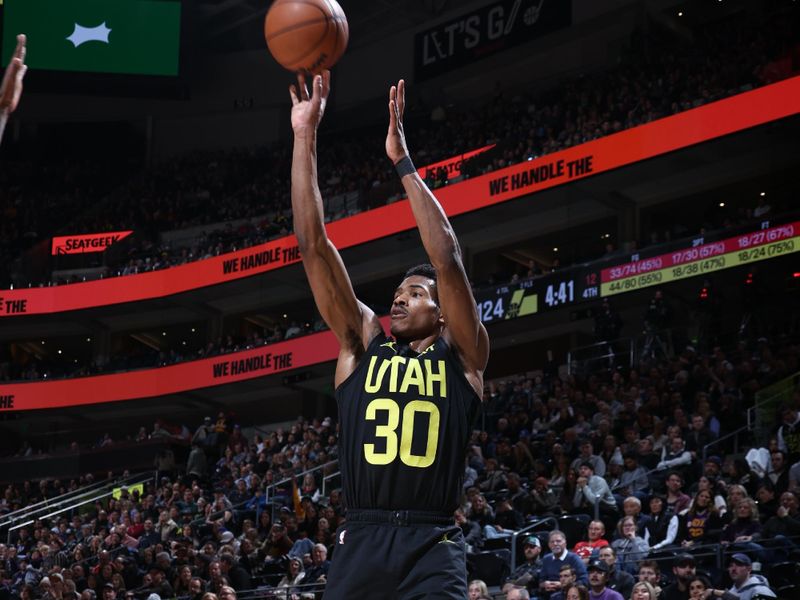 SALT LAKE CITY, UT - JANUARY 12: Ochai Agbaji #30 of the Utah Jazz shoots a three point basket during the game against the Toronto Raptors on January 12, 2024 at Delta Center in Salt Lake City, Utah. NOTE TO USER: User expressly acknowledges and agrees that, by downloading and or using this Photograph, User is consenting to the terms and conditions of the Getty Images License Agreement. Mandatory Copyright Notice: Copyright 2024 NBAE (Photo by Melissa Majchrzak/NBAE via Getty Images)