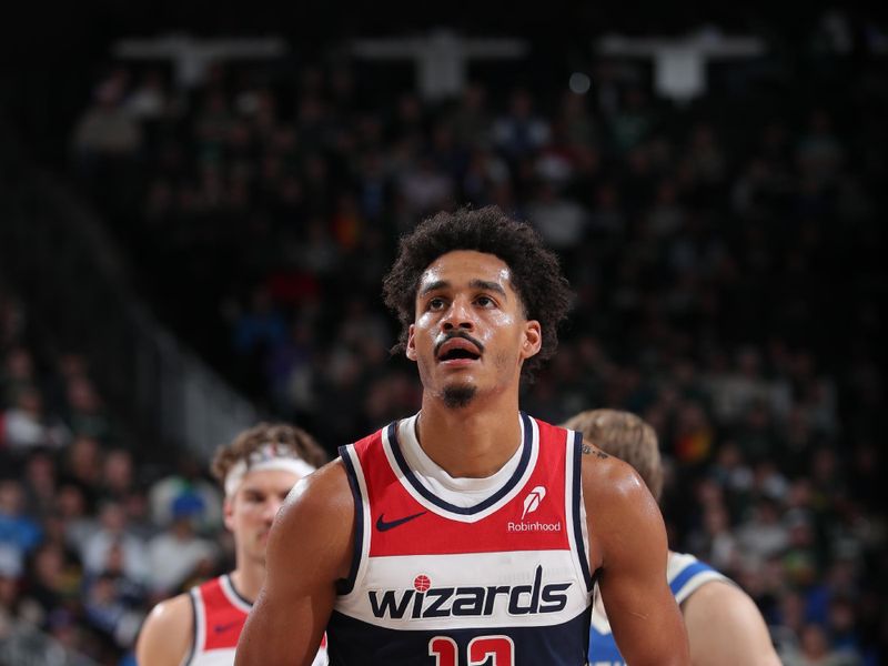 MILWAUKEE, WI - NOVEMBER 30: Jordan Poole #13 of the Washington Wizards shoots a free throw during the game against the Milwaukee Bucks on November 30, 2024 at Fiserv Forum Center in Milwaukee, Wisconsin. NOTE TO USER: User expressly acknowledges and agrees that, by downloading and or using this Photograph, user is consenting to the terms and conditions of the Getty Images License Agreement. Mandatory Copyright Notice: Copyright 2024 NBAE (Photo by Gary Dineen/NBAE via Getty Images).