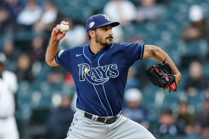 Apr 28, 2023; Chicago, Illinois, USA; Tampa Bay Rays starting pitcher Zach Eflin (24) delivers against the Chicago White Sox during the first inning at Guaranteed Rate Field. Mandatory Credit: Kamil Krzaczynski-USA TODAY Sports