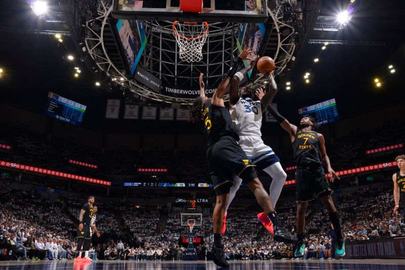 MINNEAPOLIS, MN -  MAY 6:  Julius Randle #30 of the Minnesota Timberwolves drives to the basket during the game against the Golden State Warriors during Round 2 Game 1 of the 2025 NBA Playoffs on May 6, 2025 at Target Center in Minneapolis, Minnesota. NOTE TO USER: User expressly acknowledges and agrees that, by downloading and or using this Photograph, user is consenting to the terms and conditions of the Getty Images License Agreement. Mandatory Copyright Notice: Copyright 2025 NBAE (Photo by Jesse D. Garrabrant/NBAE via Getty Images)