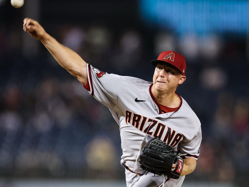 Jun 7, 2023; Washington, District of Columbia, USA; Arizona Diamondbacks relief pitcher Scott McGough (30) pitches against the Washington Nationals during the eighth inning at Nationals Park. Mandatory Credit: Scott Taetsch-USA TODAY Sports