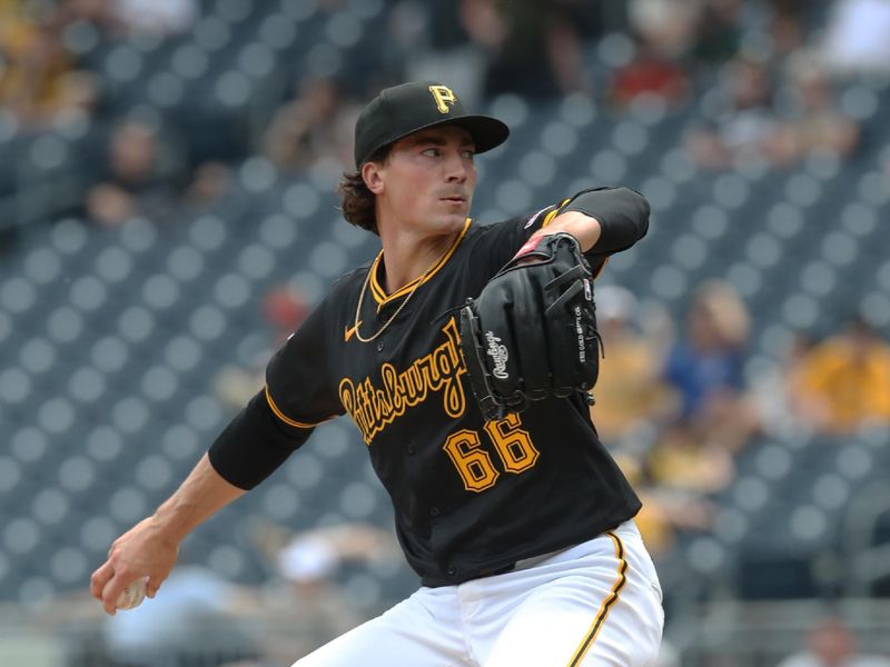 May 1, 2025; Pittsburgh, Pennsylvania, USA;  Pittsburgh Pirates relief pitcher Kyle Nicolas (66) pitches against the Chicago Cubs during the seventh inning at PNC Park. Mandatory Credit: Charles LeClaire-Imagn Images