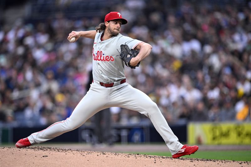 Apr 26, 2024; San Diego, California, USA; Philadelphia Phillies starting pitcher Aaron Nola (27) throws a pitch during the first inning against the San Diego Padres at Petco Park. Mandatory Credit: Orlando Ramirez-USA TODAY Sports