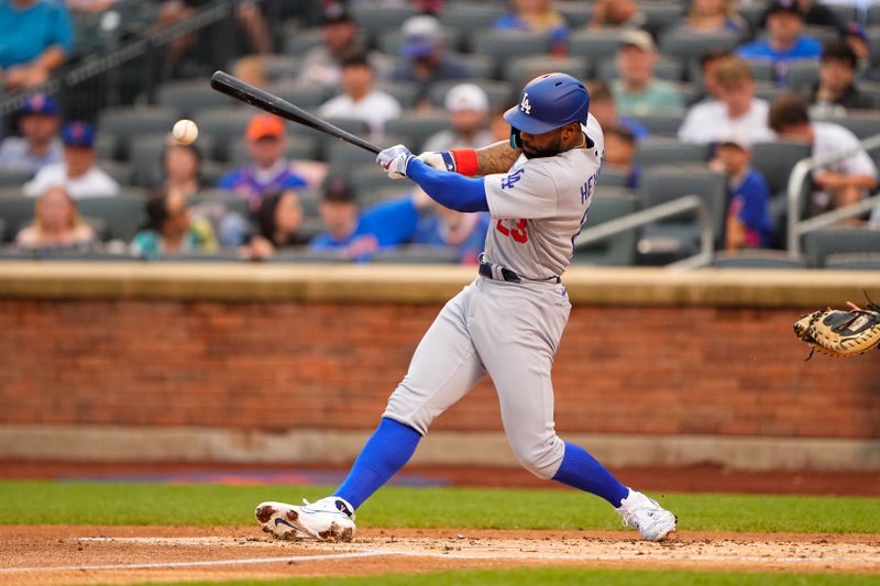 Jul 16, 2023; New York City, New York, USA; Los Angeles Dodgers right fielder Jason Heyward (23) hits a single against the New York Mets during the second inning at Citi Field. Mandatory Credit: Gregory Fisher-USA TODAY Sports