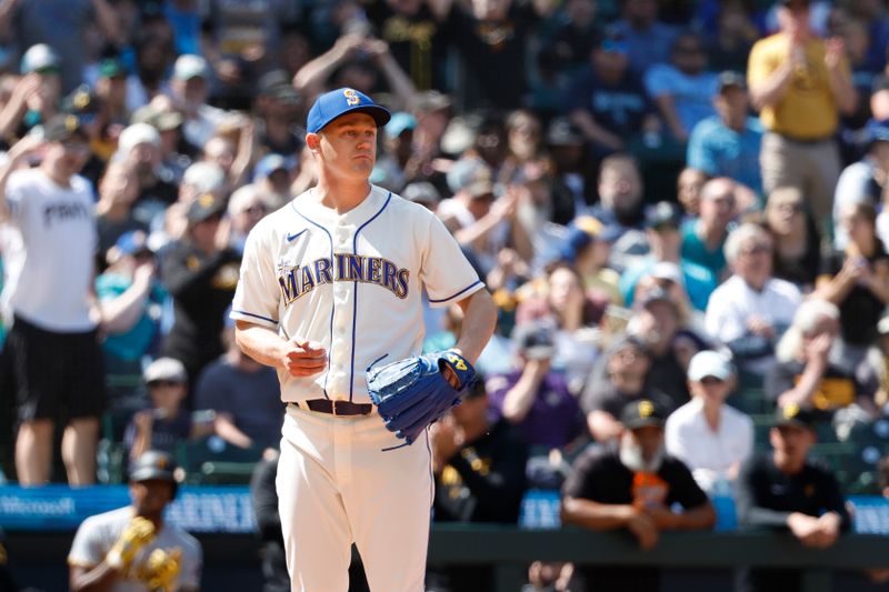 May 28, 2023; Seattle, Washington, USA; Seattle Mariners relief pitcher Paul Sewald (37) reacts after allowing a run on a wild pitch against the Pittsburgh Pirates during the eighth inning at T-Mobile Park. Mandatory Credit: Joe Nicholson-USA TODAY Sports