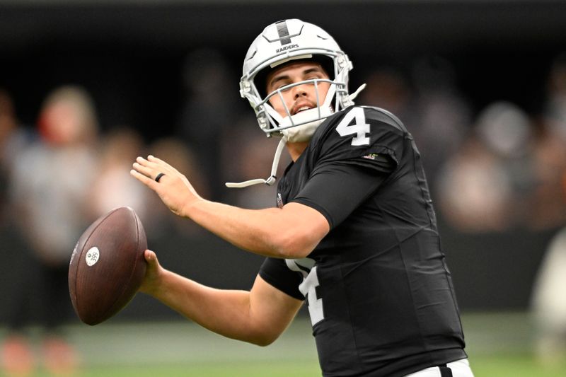 Las Vegas Raiders quarterback Aidan O'Connell #4 plays during a pre-season NFL football game against the San Francisco 49ers Sunday, Aug. 13, 2023, in Las Vegas. (AP Photo/Denis Poroy)