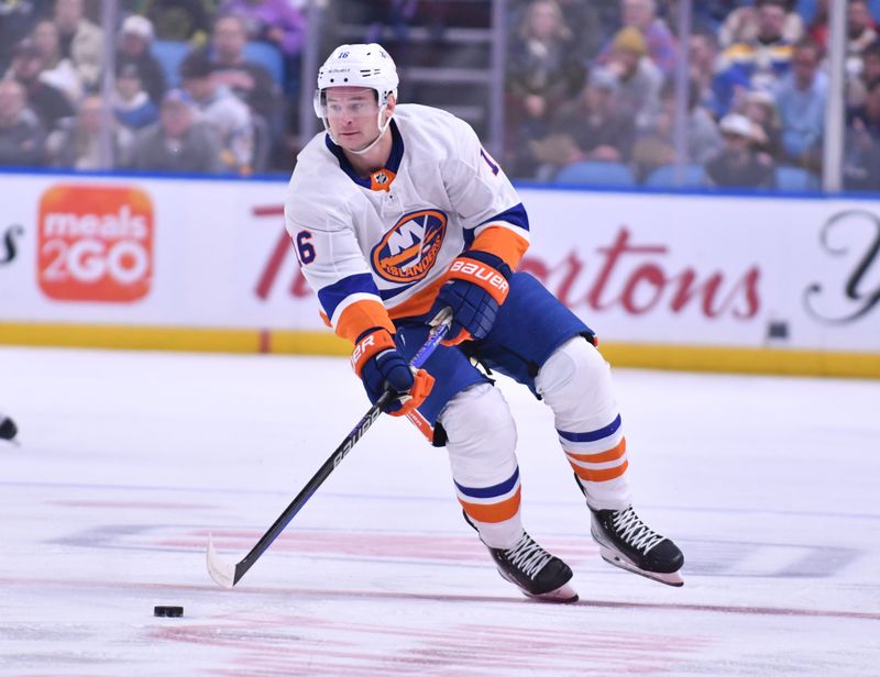 Oct 21, 2023; Buffalo, New York, USA; New York Islanders right wing Julien Gauthier (16) handles the puck in the first period against the Buffalo Sabres at KeyBank Center. Mandatory Credit: Mark Konezny-USA TODAY Sports