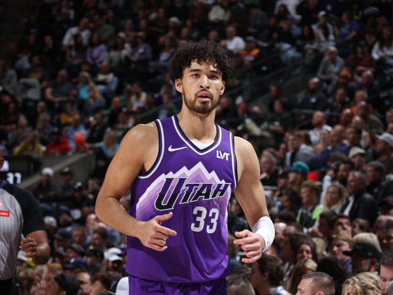 SALT LAKE CITY, UT - MARCH 4:  Johnny Juzang #33 of the Utah Jazz looks on during the game against the Washington Wizards on March 4, 2024 at vivint.SmartHome Arena in Salt Lake City, Utah. NOTE TO USER: User expressly acknowledges and agrees that, by downloading and or using this Photograph, User is consenting to the terms and conditions of the Getty Images License Agreement. Mandatory Copyright Notice: Copyright 2024 NBAE (Photo by Melissa Majchrzak/NBAE via Getty Images)