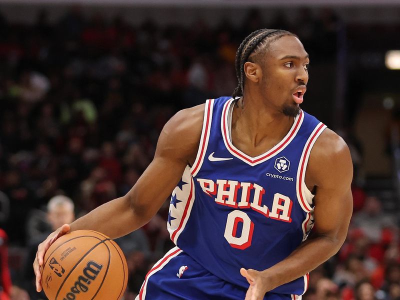 CHICAGO, ILLINOIS - DECEMBER 08: Tyrese Maxey #0 of the Philadelphia 76ers dribbles against the Chicago Bulls during the first half at the United Center on December 08, 2024 in Chicago, Illinois. NOTE TO USER: User expressly acknowledges and agrees that, by downloading and or using this photograph, User is consenting to the terms and conditions of the Getty Images License Agreement.  (Photo by Michael Reaves/Getty Images)