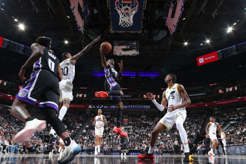 SALT LAKE CITY, UT - OCTOBER 15: Keon Ellis #23 of the Sacramento Kings drives to the basket during the game against the Utah Jazz on October 15, 2024 at Delta Center in Salt Lake City, Utah. NOTE TO USER: User expressly acknowledges and agrees that, by downloading and or using this Photograph, User is consenting to the terms and conditions of the Getty Images License Agreement. Mandatory Copyright Notice: Copyright 2024 NBAE (Photo by Melissa Majchrzak/NBAE via Getty Images)