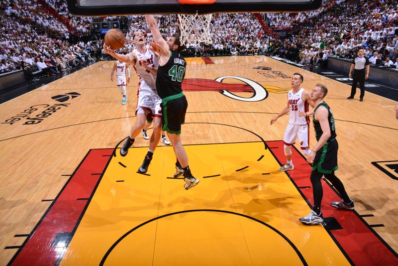 MIAMI, FL - MAY 21: Cody Zeller #44 of the Miami Heat drives to the basket during Game Three of the Eastern Conference Finals against the Boston Celtics on May 21, 2023 at Miami-Dade Arena in Miami, Florida. NOTE TO USER: User expressly acknowledges and agrees that, by downloading and or using this Photograph, user is consenting to the terms and conditions of the Getty Images License Agreement. Mandatory Copyright Notice: Copyright 2023 NBAE (Photo by Jesse D. Garrabrant/NBAE via Getty Images)