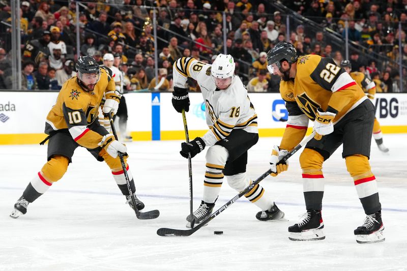 Jan 11, 2024; Las Vegas, Nevada, USA; Boston Bruins center Pavel Zacha (18) controls the puck between Vegas Golden Knights center Nicolas Roy (10) and Vegas Golden Knights right wing Michael Amadio (22) during the second period at T-Mobile Arena. Mandatory Credit: Stephen R. Sylvanie-USA TODAY Sports