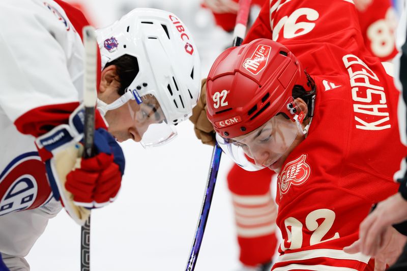 Oct 9, 2025; Detroit, Michigan, USA;  Montréal Canadiens center Alex Newhook (15) and Detroit Red Wings center Marco Kasper (92) face off in the second period at Little Caesars Arena. Mandatory Credit: Rick Osentoski-Imagn Images