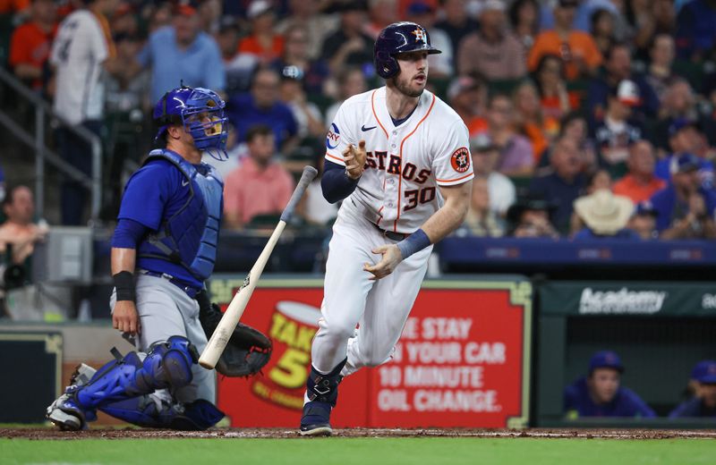 May 17, 2023; Houston, Texas, USA; Houston Astros designated hitter Kyle Tucker (30) hits a single during the first inning against the Chicago Cubs at Minute Maid Park. Mandatory Credit: Troy Taormina-USA TODAY Sports