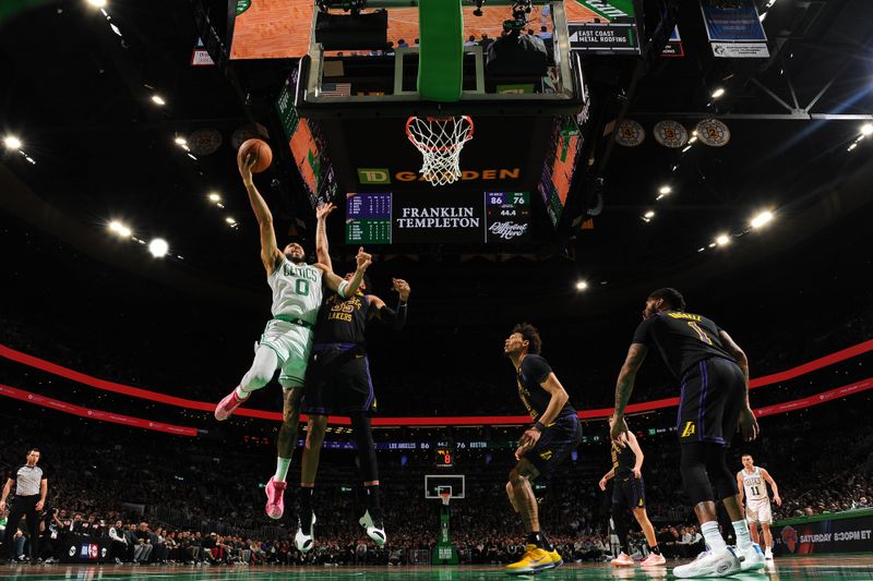 BOSTON, MA - FEBRUARY 1:  Jayson Tatum #0 of the Boston Celtics drives to the basket during the game  against the Los Angeles Lakers on February 1, 2024 at the TD Garden in Boston, Massachusetts. NOTE TO USER: User expressly acknowledges and agrees that, by downloading and or using this photograph, User is consenting to the terms and conditions of the Getty Images License Agreement. Mandatory Copyright Notice: Copyright 2024 NBAE  (Photo by Brian Babineau/NBAE via Getty Images)