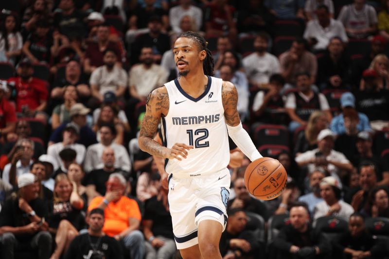 MIAMI, FL - APRIL 3: Ja Morant #12 of the Memphis Grizzlies dribbles the ball during the game against the Miami Heat on April 3, 2025 at Kaseya Center in Miami, Florida. NOTE TO USER: User expressly acknowledges and agrees that, by downloading and or using this Photograph, user is consenting to the terms and conditions of the Getty Images License Agreement. Mandatory Copyright Notice: Copyright 2025 NBAE (Photo by Issac Baldizon/NBAE via Getty Images)