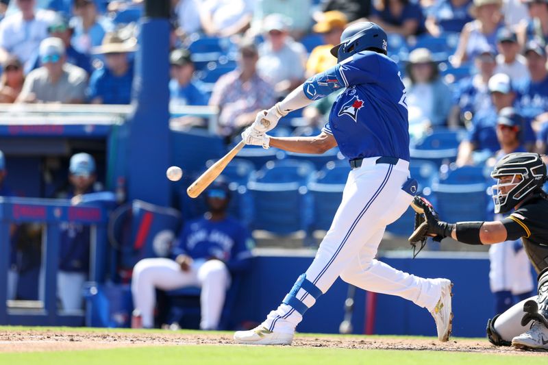 Mar 6, 2026; Dunedin, Florida, USA; Toronto Blue Jays shortstop Josh Rivera (24) hits an rbi single against the Pittsburgh Pirates in the fourth inning during spring training at TD Ballpark. Mandatory Credit: Nathan Ray Seebeck-Imagn Images