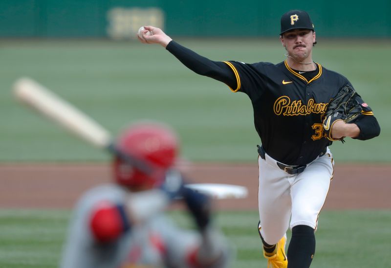 Jul 23, 2024; Pittsburgh, Pennsylvania, USA;  Pittsburgh Pirates starting pitcher Paul Skenes (30) delivers a pitch to  St. Louis Cardinals shortstop Masyn Winn (0) during the first inning at PNC Park. Mandatory Credit: Charles LeClaire-USA TODAY Sports