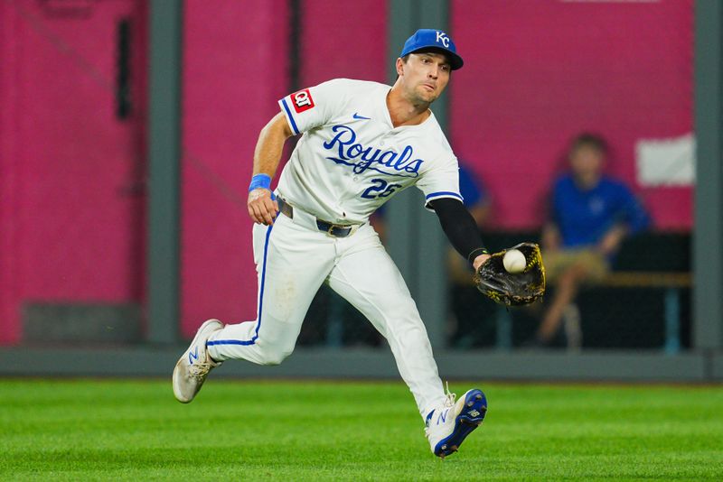 Aug 21, 2024; Kansas City, Missouri, USA;Kansas City Royals right fielder Adam Frazier (26) catches a line drive during the seventh inning against the Los Angeles Angels at Kauffman Stadium. Mandatory Credit: Jay Biggerstaff-USA TODAY Sports