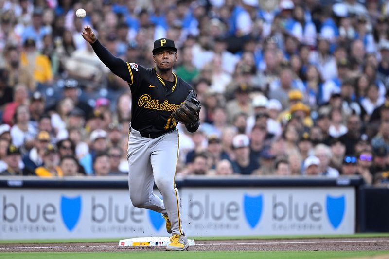 Aug 13, 2024; San Diego, California, USA; Pittsburgh Pirates third baseman Ke'Bryan Hayes (13) throws to first base during the first inning against the San Diego Padres at Petco Park. Mandatory Credit: Orlando Ramirez-USA TODAY Sports