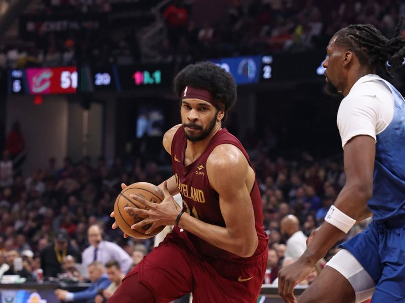 CLEVELAND, OH - March 8: Jarrett Allen #31 of the Cleveland Cavaliers handles the ball during the game against the Minnesota Timberwolves on March 8, 2024 at Rocket Mortgage FieldHouse in Cleveland, Ohio. NOTE TO USER: User expressly acknowledges and agrees that, by downloading and/or using this Photograph, user is consenting to the terms and conditions of the Getty Images License Agreement. Mandatory Copyright Notice: Copyright 2024 NBAE (Photo by Lauren Leigh Bacho/NBAE via Getty Images)